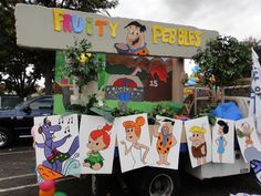 the fruity pebbles truck is decorated with pictures of cartoon characters and plants