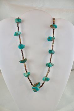 Vintage c1940's-1950's Navajo Heishi necklace Turquoise and Oyster Shell beads The turquoise appears to be natural and not color enhanced graduated stones 3/8" to 1 inch in size  measures 30 inches long strung on a cotton thread  very good condition Vintage Turquoise Necklace With Round Beads, Vintage Turquoise Necklace With Round Natural Stones, Turquoise Single Strand Southwestern Jewelry, Vintage Turquoise Gemstone Beads Jewelry, Artisan Untreated Turquoise Necklace, Bohemian Blue Untreated Necklaces, Spiritual Turquoise Necklace Collectible, Bohemian Blue Untreated Necklace, Southwestern Untreated Turquoise Necklace