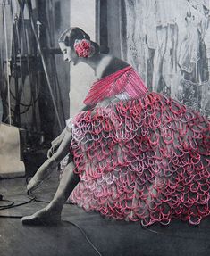 an old photo of a woman in a pink dress