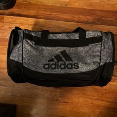 Brand New, Used One Time Gray Gym Bag With Large Capacity, Gray Large Capacity Gym Bag, Gray Large Capacity Gym Bag For Sports, Large Capacity Gray Gym Bag For Sports, Rectangular Gray Gym Bag, Sporty Gray Rectangular Bag, Sporty Gray Bag With Large Capacity, Sporty Black Tote Duffle Bag, Adidas Sporty Gym Bag For Daily Use