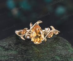 ***It's all about harmony and romance. The citrine ring set will represent your tender feelings and serious intentions in the best way. It features a flowing design with naturally wrapped leaves. Handcrafted from solid gold this engagement ring set features detailed leaves and organic lines wrapped around the central gemstone.***- Metal: Solid gold(10K/14K/18K white/yellow/rose gold),925 sterling silver,platinum available- Main Stone: 6x8mm pear citrine.- Accent Stone: citrines and moissanites- Yellow Citrine Engagement Ring, Branch Wedding Ring, Engagement Ring Nature, Citrine Engagement Ring, Citrine Ring Engagement, Nature Engagement Ring, Anniversary Ring Set, Yellow Engagement Rings, Wedding Anniversary Rings