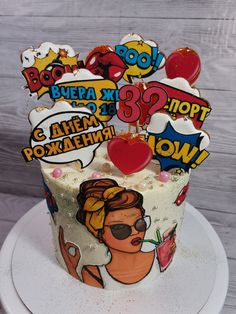 a birthday cake decorated with stickers and decorations