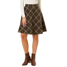 A classic plaids worsted skirt inspired by perennially chic schoolgirl style is made modern for fall with an elastic waist that adds movement to the knee-length silhouette. You can pair with your long sleeves blouse or casual top, and a pair of heels to show your charming look! Occasion: Casual, Street, Dating, Party, Weekend Gathering, Holiday, Daily Wear, Halloween Days, Christmas Days, etc. Body Size Chart (in inches) International Size------Waist Girth-----------Hip Girth XS---------------------------25 1/4---------------35 3/4 S-----------------------------27--------------------38 M----------------------------29--------------------40 L-----------------------------32 1/4---------------43 XL---------------------------38--------------------48 More Styles, More Choices, CLICK HERE. Color: Plaid Print Skirt, Casual Denim Skirt, Fit And Flare Skirt, Sleeves Blouse, Brown Outfit, Denim Midi Skirt, Straight Skirt, Plaid Skirts, Knee Length Skirt