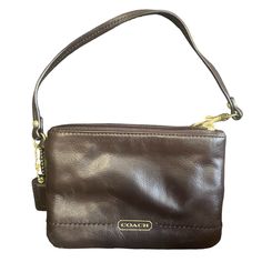 Coach Leather Brown Wristlet. It’s Been In A Storage Bin. 4x6 Classic Pouch Wristlet With Zipper Closure, Classic Clutch Wristlet With Zipper, Classic Clutch Wristlet With Zipper Closure, Classic Wristlet Clutch With Zipper Closure, Classic Everyday Wristlet, Elegant Leather Rectangular Wristlet, Elegant Brown Leather Wristlet, Elegant Brown Wristlet For Evening, Coach Rectangular Leather Wristlet