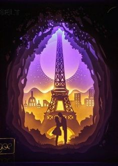 the eiffel tower is lit up at night