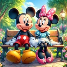 two mickey and minnie mouse sitting on a bench