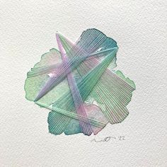 an abstract painting with green and purple lines on white paper, in the shape of a flower