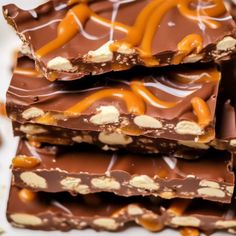 chocolate and caramel candy bars stacked on top of each other