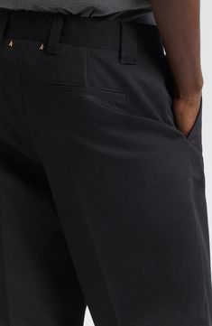 The label's signature star-shaped hardware spangles the back waistband of straight-leg skate pants boasting a tailored fit with cuffed hems. Zip fly with hook-and-bar closure Front slant pockets; back button-welt pockets 40% cotton, 40% elastomultiester, 20% polyester Dry clean Made in Italy Designer Clothing Black Straight Bottoms For Workwear, Black Straight Bottoms For Work, Black Straight Bottoms For Formal Occasions, Black Straight Bottoms With Welt Pockets, Straight Black Bottoms With Welt Pockets, Classic Black Chinos With Belt Loops, Black Wide Leg Chinos With Belt Loops, Black Work Pants With Belt Loops, Black Dress Pants For Workwear With Standard Cut