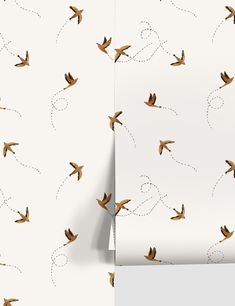 two wallpapers with birds flying in the air