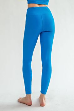 ABOUT These gorgeous Sonic Blue Nylon Rib Yoga Leggings will be your new go-to for any activity! From Yoga to running errands, you'll be feeling comfy and free in this high-waisted, Sonic Blue gem. Plus, you'll look oh-so-gorgeous, so get ready to turn some heads! *Rae Mode is an affordable, popular, premium quality fitness wear brand with a 4.8/5.0 star rating. DETAILS Yoga leggings High waisted Full length Key pockets Buttersoft fabric Compression fabric Flattering fit CARE INSTRUCTIONS Machin Blue Nylon Tights For Gym, Blue Micro-elastic Activewear For Sports, Blue Nylon Yoga Pants For Pilates, Blue High Stretch Nylon Activewear, Blue Nylon Leggings For Training, Blue Nylon Workout Tights, Blue Stretch Nylon Leggings, Blue Nylon Yoga Pants, Blue Nylon Athleisure Yoga Pants