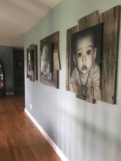 a hallway with pictures hanging on the wall