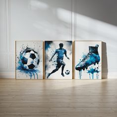 three paintings of soccer players are displayed on the wall in an empty room with hard wood flooring