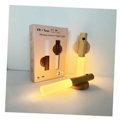 two different types of lights are shown in front of a box