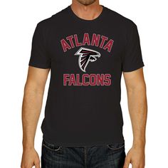 a man wearing a black atlanta falcons t - shirt