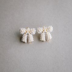 what we love about these earrings: •cutest chunky bow shape •gold filled base and posts •white pearls all over Bow Earrings, Gold Plated Silver, Earring Necklace, Pearl White, Bag Sale, Ear Cuff, Gold Filled, Polymer Clay, Silver