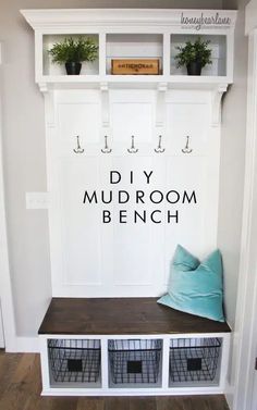 a mudroom bench with storage baskets underneath and the words diy mudroom bench above it