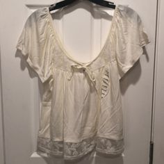 Cream Color Lace Tie Front Top Casual Off White Relaxed Fit Blouse, Casual Off-white Relaxed Fit Blouse, Casual Off White Blouse For Summer, Casual Off White Summer Blouse, Casual Off-white Blouse For Summer, Casual Off-white Summer Blouse, Casual Spring Tops With Lace Trim, Casual Summer Blouse With Lace Trim, Casual Lace Trim Tops For Spring