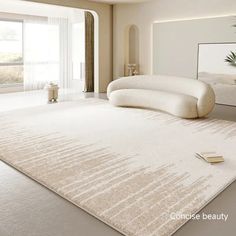 a large white rug in the middle of a room