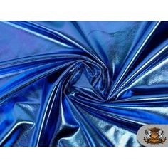 an image of blue satin fabric with metallic foil on the bottom and center, as well as