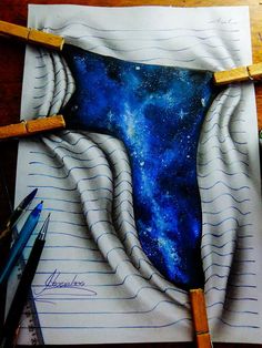 a piece of paper that has been drawn to look like a tie with the galaxy in it