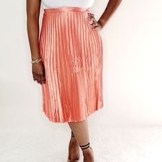 Pleated Knee Length Skirt Side Zipper 100% Polyester Model Wearing Large Summer Midi Pleated Skirt For Night Out, Red Knee-length Pleated Skirt For Spring, Red Pleated Midi Skirt For Spring, Chic Red Pleated Skirt For Spring, Elegant Red Pleated Skirt For Spring, Elegant Orange Skirt For Spring, Orange Pleated Party Skirt, Orange Pleated Skirt For Party, Red Pleated Skirt For Spring