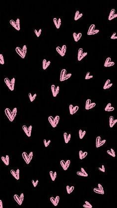 pink hearts are drawn on a black background