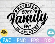 the family trip logo is shown on a white brick wall with different colored stickers