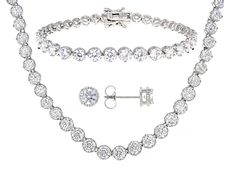 Pre-Owned Bella Luce® white diamond simulant 43.38ctw round, rhodium over sterling silver jewelry set. Bracelet measures approximately 7" L x 0.25" W and has a box clasp closure. Necklace measures approximately 18" L x 0.25" W and has a hidden box clasp closure. Earrings measure approximately 0.25" L x 0.25" W and has push back backings. Diamond equivalent weight is 26.29ctw..  This product may be a customer return, vendor sample, or on-air display and is not in its originally manufactured condi Classic White Gold Cubic Zirconia Jewelry, Classic White Gold Jewelry With Prong Setting, Classic Formal Jewelry With Diamond Cut, Luxury White Gold Sterling Silver Jewelry Sets, Platinum Jewelry With Round Stone For Gifts, White Gold Jewelry With Brilliant Round Cut, Dazzling White Platinum Jewelry, Classic Silver Cubic Zirconia Jewelry, Silver Cubic Zirconia Jewelry With Pave Setting