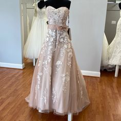 a dress on display in a bridal shop