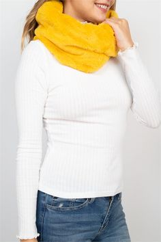 Stay cozy and chic with our vibrant faux fur infinity scarf in pink or yellow, the ultimate accessory for chilly days. Crafted with luxurious faux fur, this infinity scarf adds a pop of color and texture to any outfit, while keeping you snug and stylish. Elevate your winter wardrobe with this must-have accessory, perfect for adding warmth and flair to your look. Yellow Winter Scarves, Fur Scarf, Stay Cozy, Winter Wardrobe, Infinity Scarf, Faux Fur, Color Pop, Turtle Neck, Texture