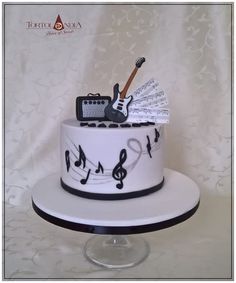 a white cake with musical notes on it