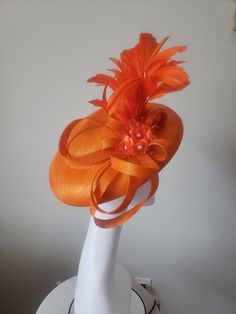 This beautiful medium brim Sinamay hat was crafted with the not so extroverted in mind. Not all of us want to appear in events very loud, but we all still want to make statements no matter how conservative. This is so outstanding, yet very subtle for those events you want compliments without being so bold. This is fitted with a head band to keep it in place especially during winding periods. This is great for church, weddings, mother of bride and groom and all events/races, you can never be overdressed in this. Church Weddings, Sinamay Hats, Wedding Fascinators, Mother Of Bride, Head Band, Wedding Hair Accessories, Christening, Bride Groom, Fascinator