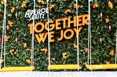 an advertisement for apricot spirit together we joy is displayed on the side of a building