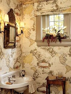 a bathroom with a map on the wall