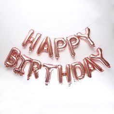 some balloons that say happy birthday are in the shape of letters on a white background