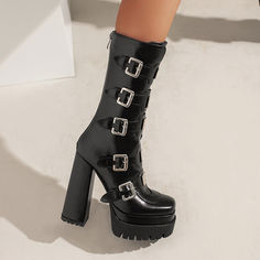 Looking for a unique and stylish way to add some edge to your wardrobe? Check out our gothic platform boots! These beautiful black boots are perfect for dressing up or down. and they really make a statement. They feature buckles for a dramatic look. and they're calf-height for added style. Plus. they have a chunky platform heel that provides both comfort and style.Whether you're hitting the town or just hanging out at home. our gothic platform boots are sure to add some fun and flair to your loo Punk Knee-high Platform Boots For Party, Gothic Ankle Platform Boots For Fall, Gothic High Heel Combat Boots For Fall, Gothic Winter Platform Ankle Boots, Punk Knee-high Platform Boots For Night Out, Knee-high Punk Platform Boots For Night Out, Punk High Heel Platform Boots With Buckle Closure, Gothic Platform Heeled Boots For Fall, Alternative Style Knee-high Platform Boots For Party