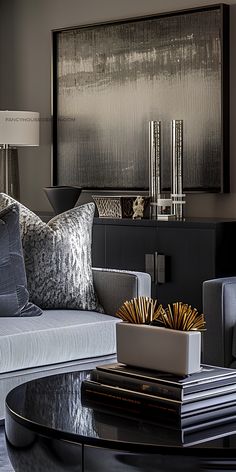 a living room filled with lots of furniture and pillows on top of a coffee table