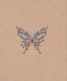 a drawing of a butterfly on a piece of brown paper with stars and sparkles