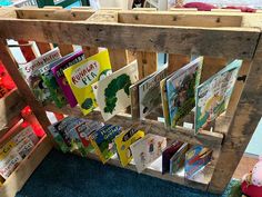 there are many children's books on display in the store, including one for each child