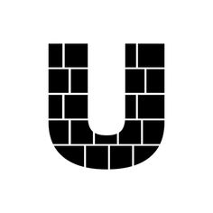 the letter u is made up of black bricks and white letters are arranged around it