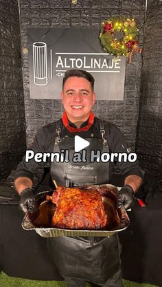 a man holding a roasting pan filled with meat