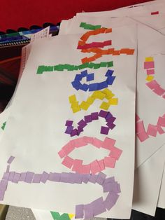 several pieces of paper that have been made to look like letters