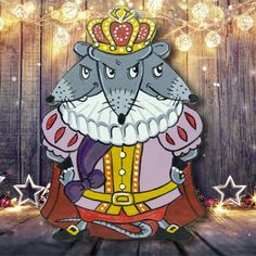 a paper cutout of a mouse wearing a crown on top of a wooden table