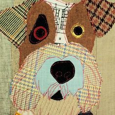 a close up of a dog made out of fabric