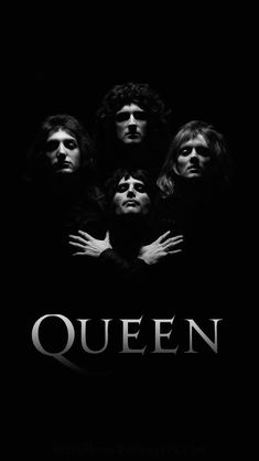 the band queen with their arms around each other in black and white, against a dark background