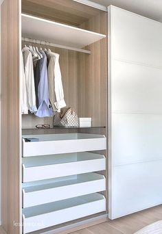 an open closet with clothes hanging on the wall and a quote about sliding doors that are fitted with composities