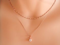 rose gold diamond necklace April birthstone necklace solitaire necklace diamond choker tiny diamond necklace delicate tiny CZ necklace Sterling silver 925 or gold vermeil (gold over sterling silver 925) delicate chain runs through a small sterling silver rhodium plated 925 or gold vermeil pendant. The pendant has in the middle a beautiful small sparkilng cz. The gold vermeil pendant can be yellow or rose gold. You can layer this cz pendant necklace with chain necklaces or charm necklaces! A beau Rose Gold Fine Jewelry Charm Necklace, Rose Gold Necklace With Delicate Chain, Rose Gold Fine Jewelry Necklace With Delicate Chain, Rose Gold Delicate Chain Necklace Fine Jewelry, Fine Jewelry Rose Gold Charm Necklace With Adjustable Chain, Rose Gold Charm Necklace With Adjustable Chain, Tarnish Resistant Wedding Jewelry Round Pendant, Tarnish Resistant Round Pendant Jewelry For Wedding, Tarnish Resistant Round Pendant For Wedding