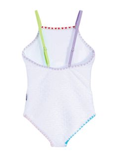 Prepare for a summer full of compliments with our Mireya one-piece swimsuit for girls, designed with colorful elastic straps and an easy pull-on design. Adorned with vibrant multicolor embroidery trim detail, this swimsuit is sure to turn heads wherever she goes. The flattering fitted design crafted from soft textured stretch fabric ensures comfort without compromising style. Embrace a classic fit silhouette that's perfect for fun-filled days under the sun. Every Limeapple suit is designed in Ca Multicolor Embroidery, Chic Swimsuit, Girls Swimwear, Embroidered Trim, Drip Dry, Living Life, Trim Detail, Fabric Shop, Wrap Skirt