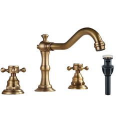 an antique style faucet with three handles and two sprayers, in gold